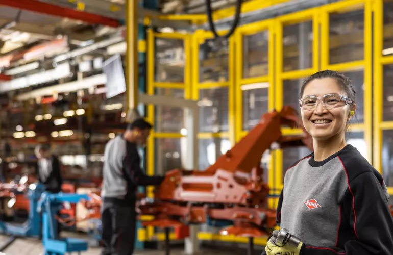 Employee working at the manufacturing in KUHN Saverne, France