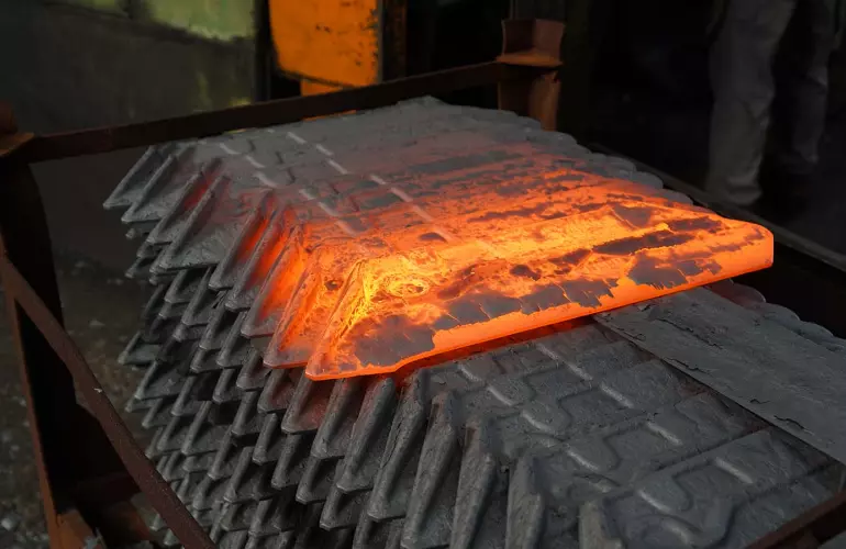 Photo illustrant une pièce détachée KUHN en production usine.