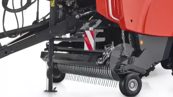 Széles, bütykös vezérlőpályás rendfelszedő, hengeres terményleszorítóval és rendterelővel.