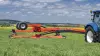 KUHN GMD 5251 TC large-width trailed disc mower on the road